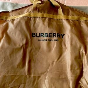 A Burberry wool coat . Perfect for the fall weather. Autumn seasoned.